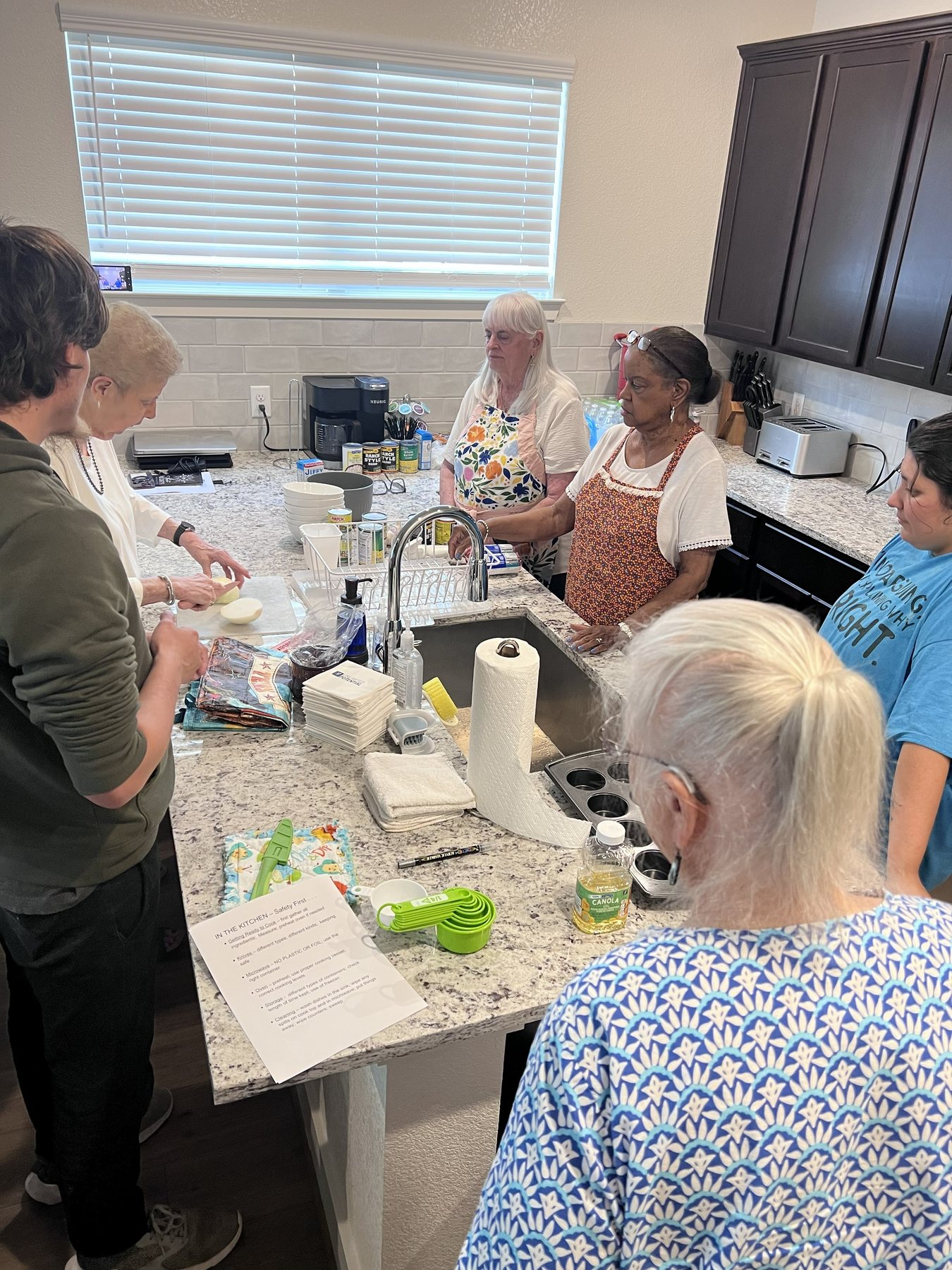 A group practicing cooking and kitchen skills